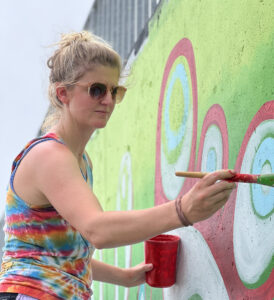 supachan chandler condon painting mural for Lauridsen Skatepark, Des Moines